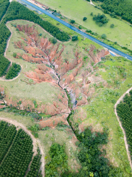 istock Erosion that evolved into gully near the highway 1305528963