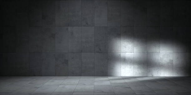 istock Empty dark abstract industrial cement wall studio room interior for display product on concrete wall background 1305539841