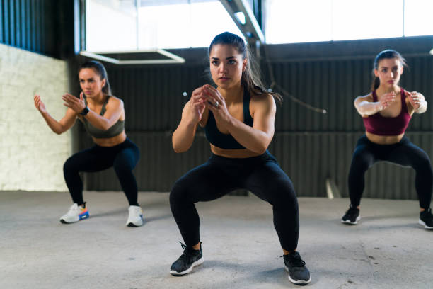 istock Pretty caucasian woman exercising with a cardio workout 1305549672