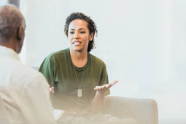 istock Soldier gestures in frustration during counseling session 1305552433