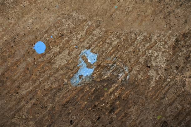 istock spilled paint into abstract images 1305555218
