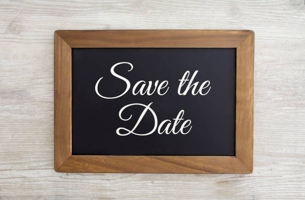 Save the Date Save the Date written on a black chalk board with a wooden frame, stock photo. launch event photos stock pictures, royalty-free photos & images