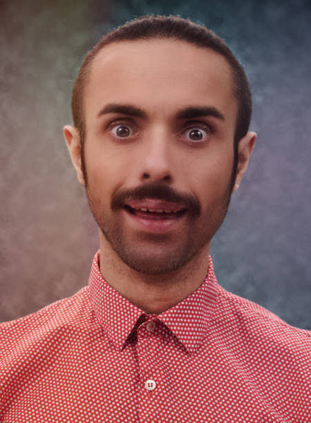 portrait of a silly man looking at the camera