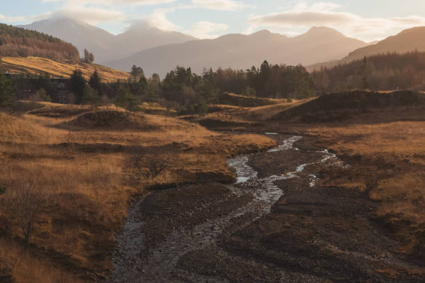 Tyndrum. Scottish Highlands Mountain landscape view with golden light in the village of Tyndrum in the Scottish Highlands, Scotland. golden hour photos stock pictures, royalty-free photos & images