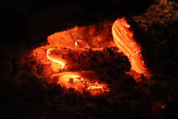 istock Embers of a burning log 1305561265