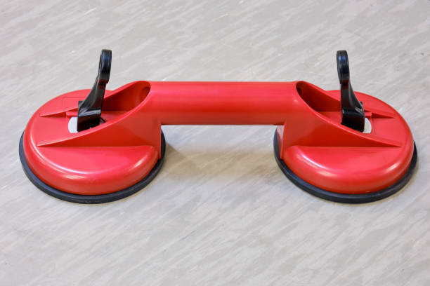 istock Double vacuum suction cup for removing tiles from floors or window panes 1305563006