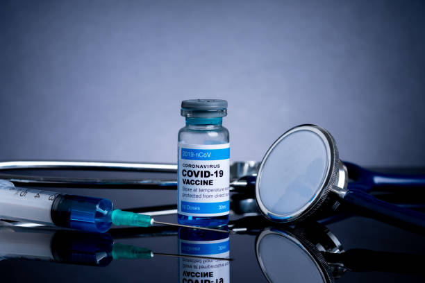 istock Covid vaccine bottle with close up view 1305563052