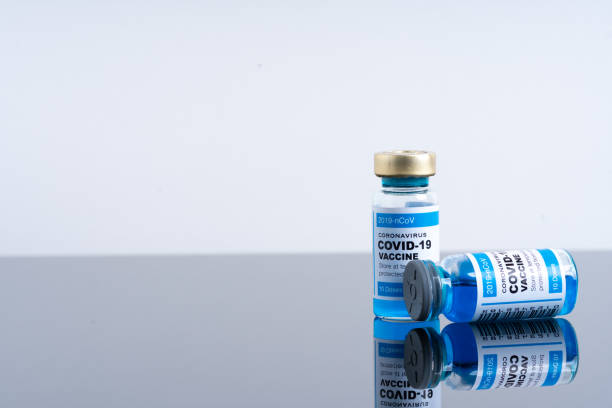 istock Covid vaccine bottle with close up view 1305563058
