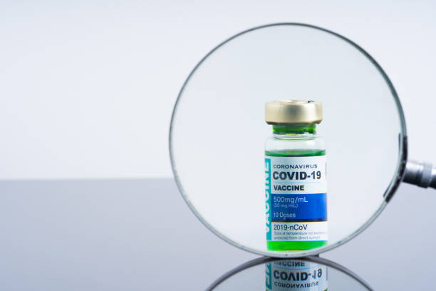 istock Covid vaccine bottle with close up view 1305563064