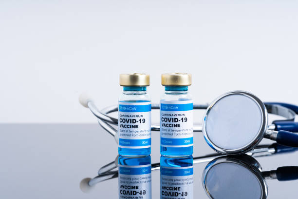 istock Covid vaccine bottle with close up view 1305563076