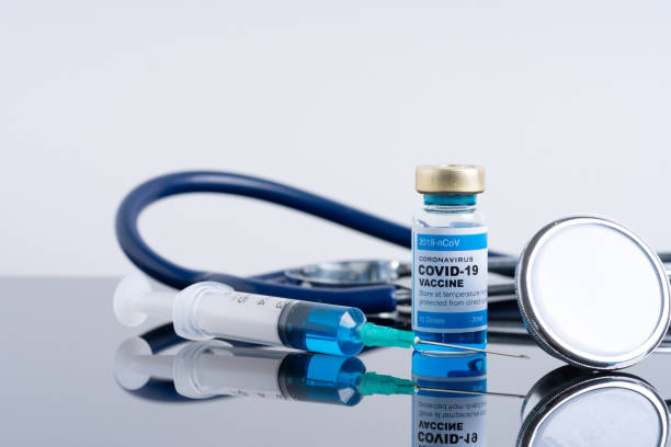 istock Covid vaccine bottle with close up view 1305563080