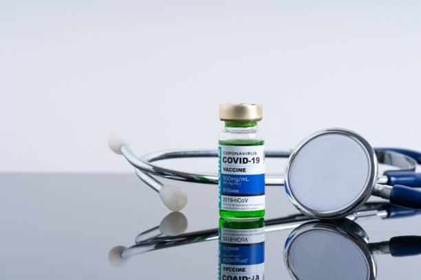 istock Covid vaccine bottle with close up view 1305563116