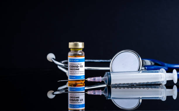 istock Covid vaccine bottle with close up view 1305563117