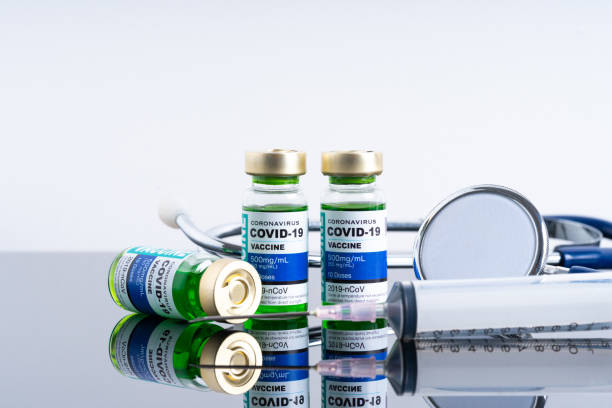 istock Covid vaccine bottle with close up view 1305563131