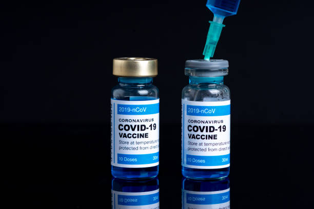 istock Covid vaccine bottle with close up view 1305563160