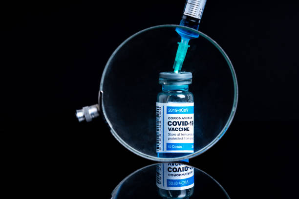 istock Covid vaccine bottle with close up view 1305563163