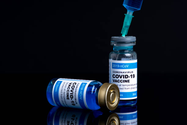 istock Covid vaccine bottle with close up view 1305563675