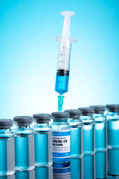 istock Covid vaccine bottle with close up view 1305564711