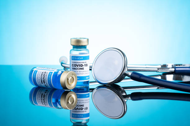 istock Covid vaccine bottle with close up view 1305564726
