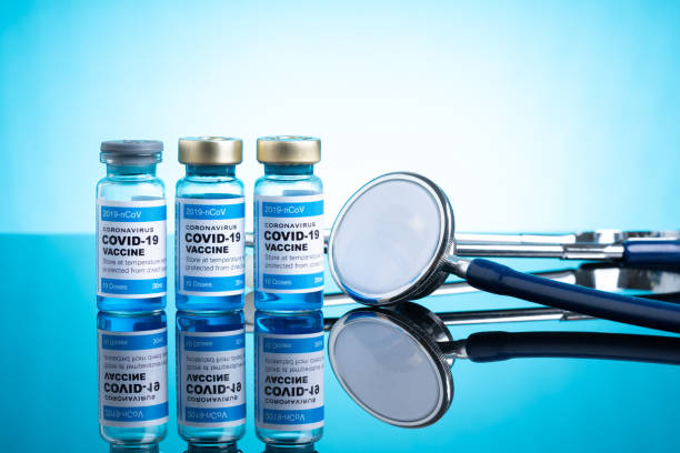 istock Covid vaccine bottle with close up view 1305564740