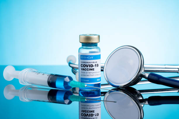 istock Covid vaccine bottle with close up view 1305564741