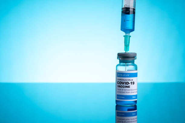 istock Covid vaccine bottle with close up view 1305564782