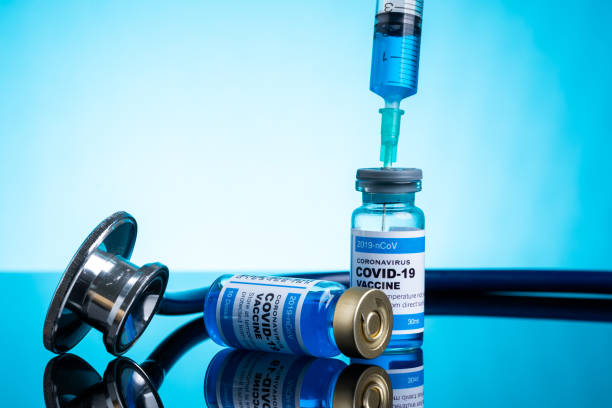istock Covid vaccine bottle with close up view 1305564792