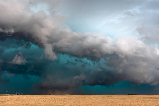 istock Supercell thunderstorm with ominous storm clouds 1305566322