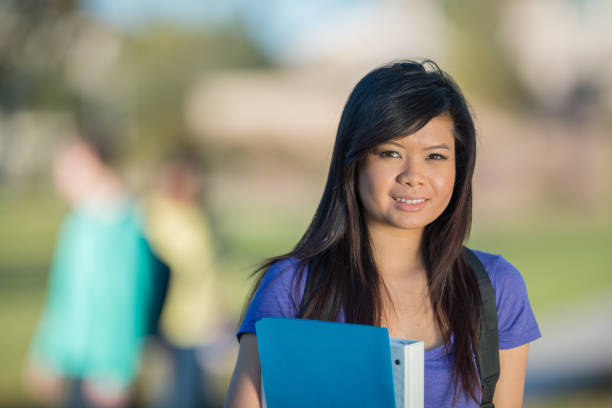 istock Smiling High School Student Stock Photo 1305570015