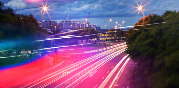 istock Light trails on city street 1305575654