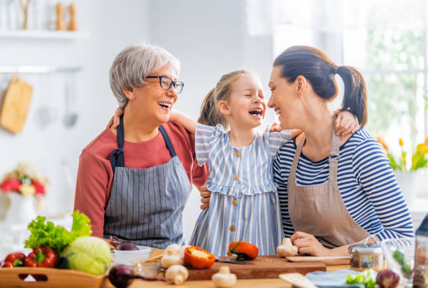 istock Happy family in the kitchen. 1305578493