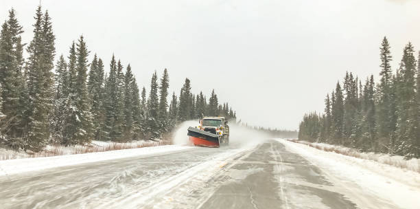 istock Snowplow on Winter Road in Alaska 1305579316