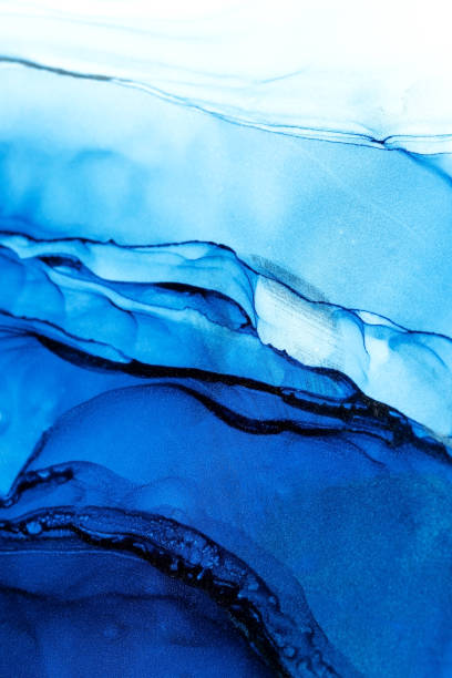istock Closeup blue and aquamarine ink abstract texture 1305579422