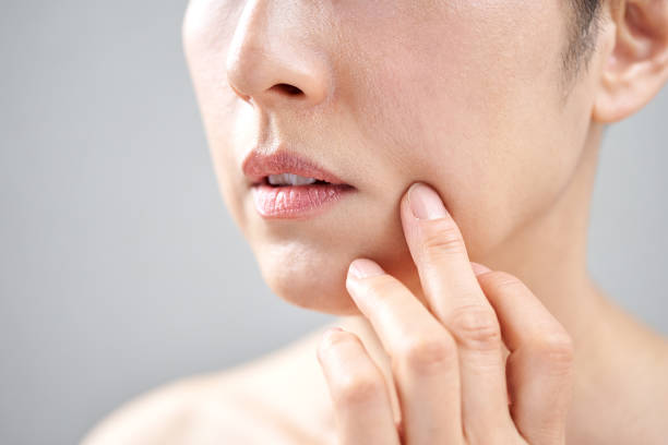 middle-aged japanese woman who cares about nasolabial fold - wrinkled skin imagens e fotografias de stock