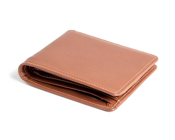 istock Brown men's genuine leather wallet isolated on white background. 1305588713