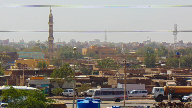 housing in Khartoum The house of the residents in Khartoum with a beautiful and towering mosque tower, with the crowds of the residents khartoum stock pictures, royalty-free photos & images
