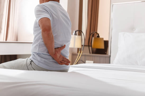 istock Asian old man is having back pain after slept 1305597780