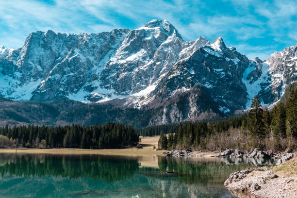 istock Spring morning at the alpine lake 1305608944