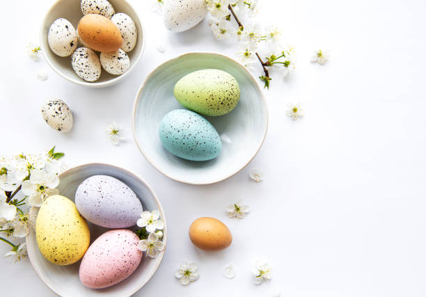 istock Colorful Easter eggs with spring blossom flowers 1305610797