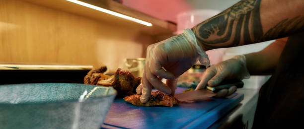 istock Chef preparing delicious food in the kitchen 1305618127