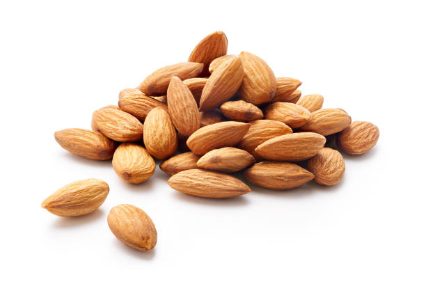 istock Heap of almonds isolated on white background - clipping path included 1305619901