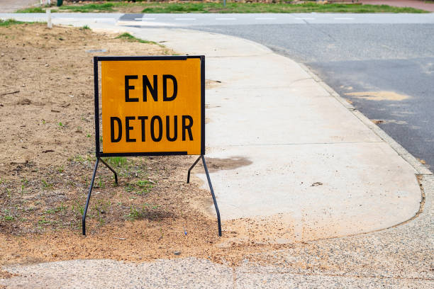 istock Yellow traffic end detour sign 1305620275