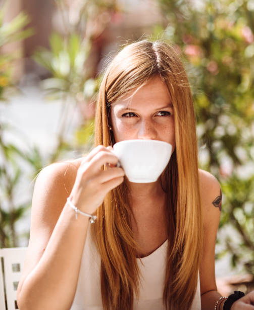 istock woman take a coffee at the cafe 1305622413