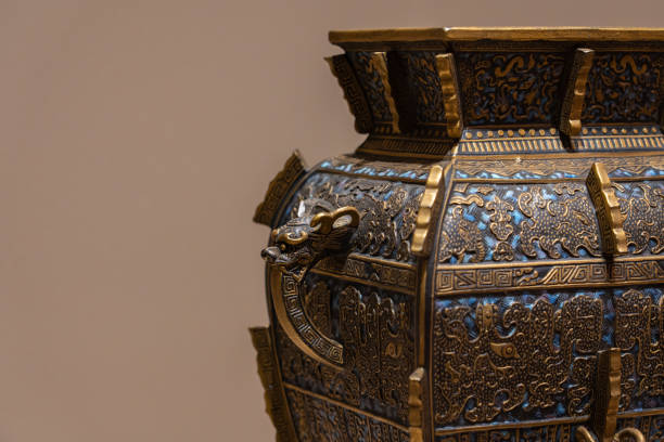 istock Ancient China Cloisonne Enamel Jar Chinese Dragon Head Handle Close-up 1305625717