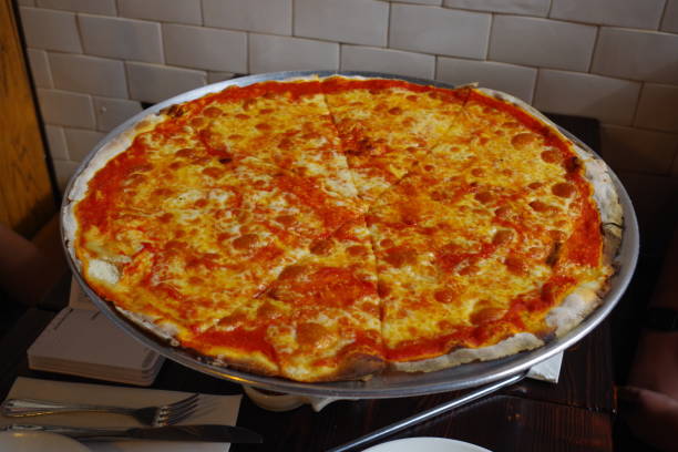 istock New York style pizza pie 1305627573