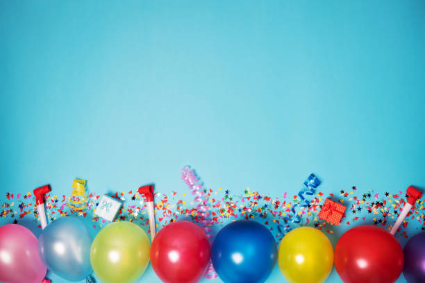 istock Flat party decoration concept on pastel blue background from above 1305628880