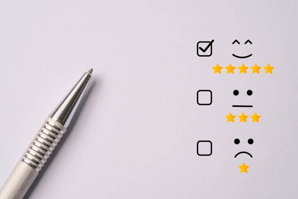 istock Metallic pen lay down after do customer satisfaction survey  , questionnaire concept. 1305630115
