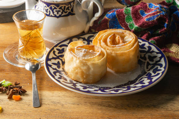 istock Dessert Firewood. Crispy dough with honey and powdered sugar. 1305631398