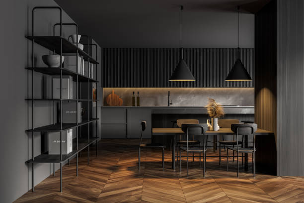 istock Gray and wooden kitchen with table and cupboard 1305633088