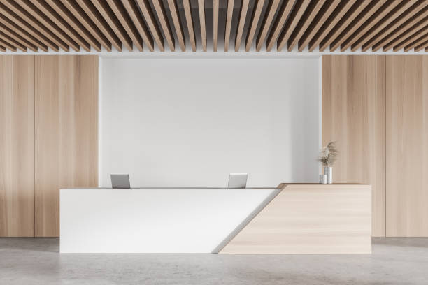 istock White and wooden office waiting room with reception 1305633878
